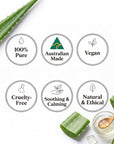 Six circular badges on a white background highlighting product benefits: 100% Pure, Australian Made, Vegan, Cruelty-Free, Soothing & Calming, and Natural & Ethical. Aloe vera leaves and a small glass jar with a wooden spoon are arranged around the badges.